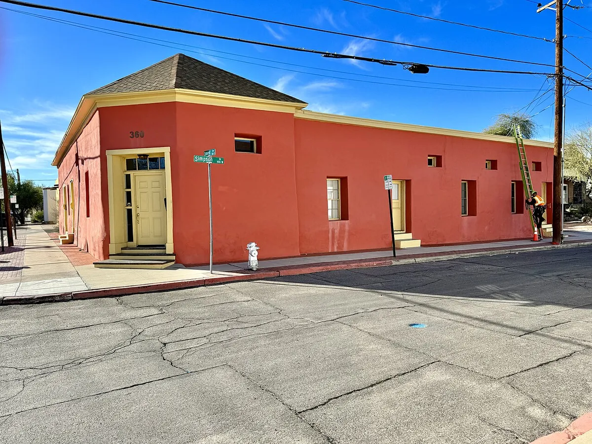 Red-plastered corner building at Convent Avenue and Simpson Street in Barrio Viejo, Tucson