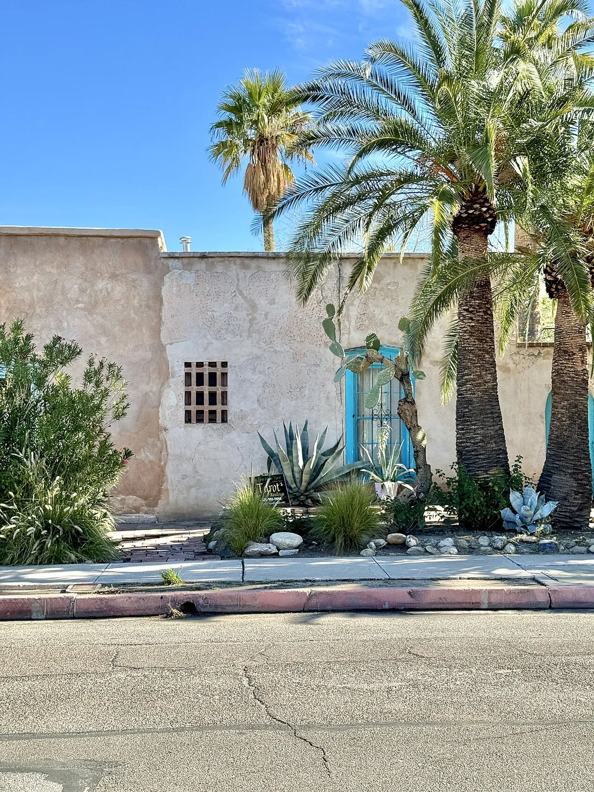 Adobe repair in Tucson: weathered plaster over adobe on Main Avenue, El Presidio